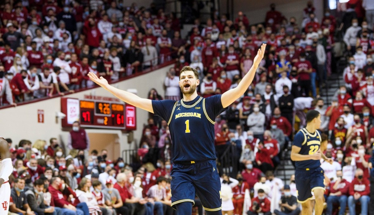 Michigan's Hunter Dickinson (1) celebrates a 3-pointer to put Michigan up 14 during the second half of the Indiana versus Michigan men's basketball game at Simon Skijodt Assembly Hall on Sunday, Jan. 23, 2022.