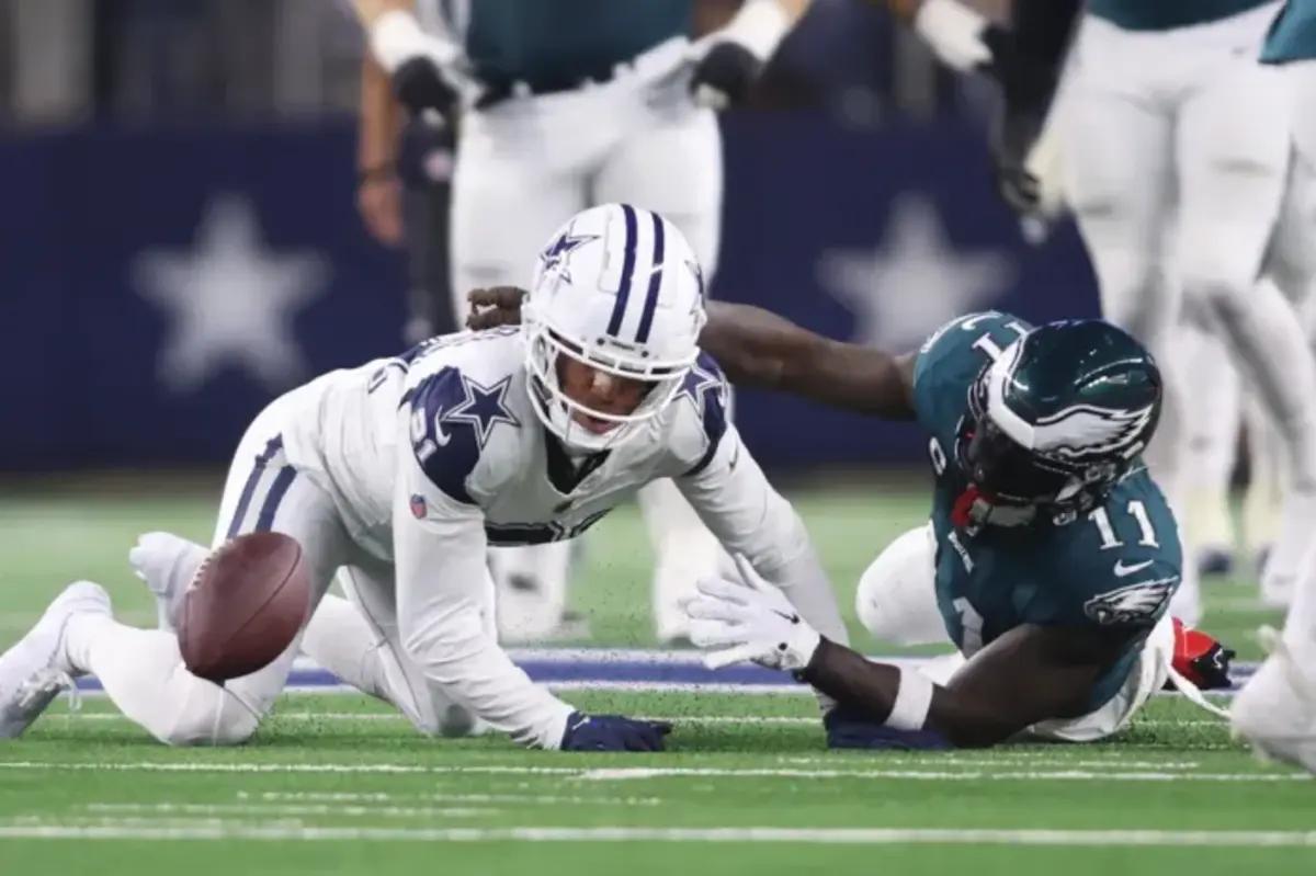 Cowboys CB Stephon Gilmore makes a play on the ball against Eagles WR A.J. Brown.