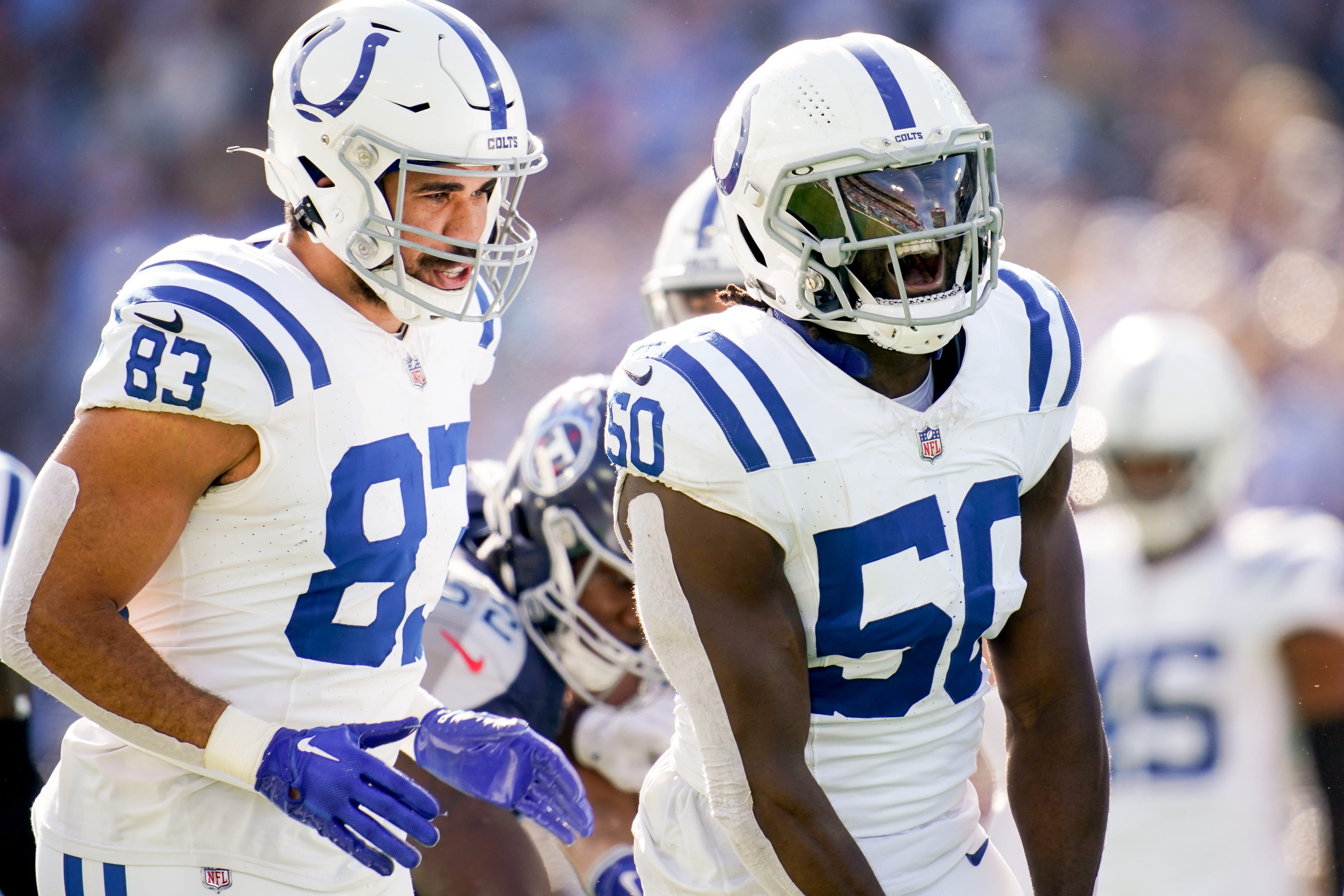 Indianapolis Colts linebacker Segun Olubi (50) celebrates tackling Tennessee Titans running back Tyjae Spears during the first quarter at Nissan Stadium in Nashville, Tenn., Sunday, Dec. 3, 2023.  