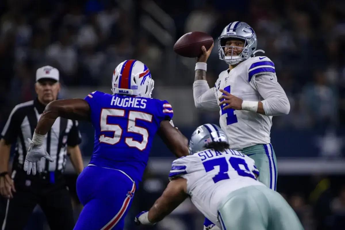 Cowboys quarterback Dak Prescott pressured during a game against the Bills in 2019.