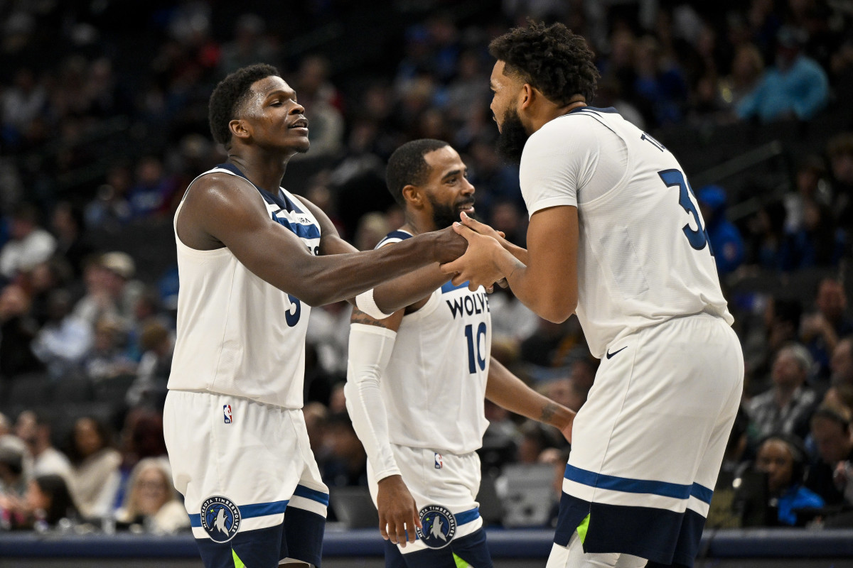 Anthony Edwards and Karl-Anthony Towns celebrate