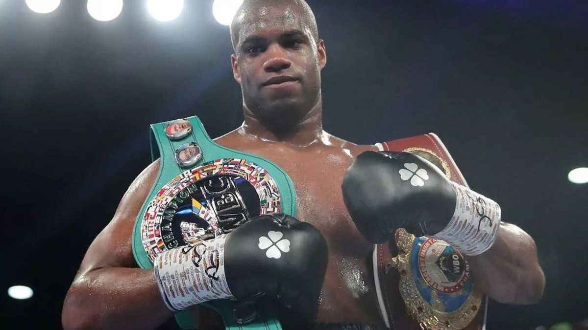 Daniel Dubois celebrates with the belts after knocking out Kyotaro Fujimoto during the WBC Silver and WBO International Heavyweight Title fight. Daniel Dubois and Jarrell Miller will square off in a heavyweight match at the Jeddah Super Dome in Jeddah, Saudi Arabia, on December 23. JAMES CHANCE/GETTY IMAGES.