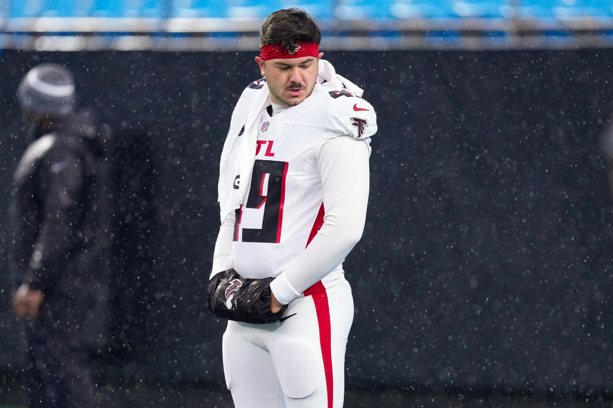 Atlanta Falcons long snapper Liam McCullough (49) stands on the field during warm ups before the game against the Carolina Panthers at Bank of America Stadium.