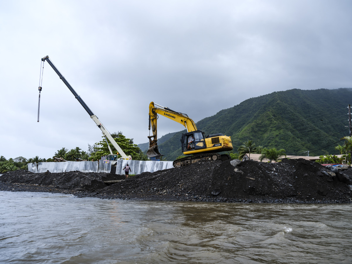 Construction at Teahupo'o in Tahiti, site of the 2024 Olympic surfing event.