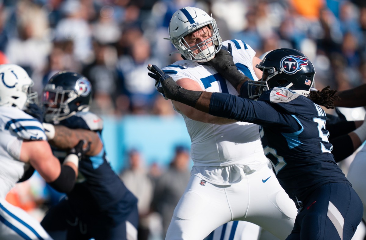 Tennessee Titans defensive end Denico Autry (96) battles with Indianapolis Colts offensive tackle Blake Freeland (73) during their game at Nissan Stadium in Nashville, Tenn., Sunday, Dec. 3, 2023.