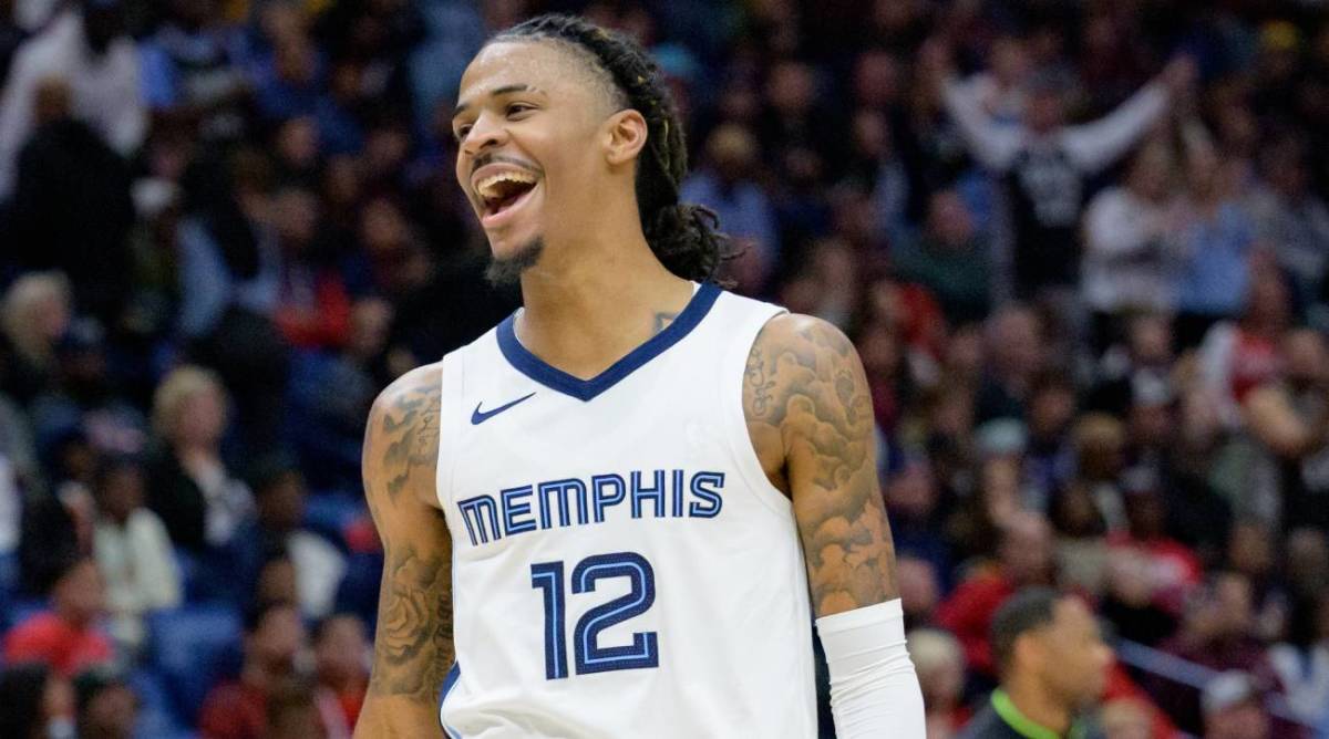 Ja Morant reacts after a play against Pelicans.