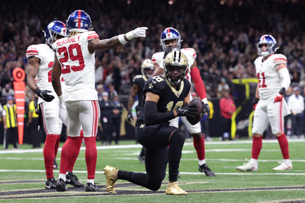 New Orleans Saints wide receiver Keith Kirkwood (18) celebrates with quarterback Taysom Hill (7) after a touchdown catch