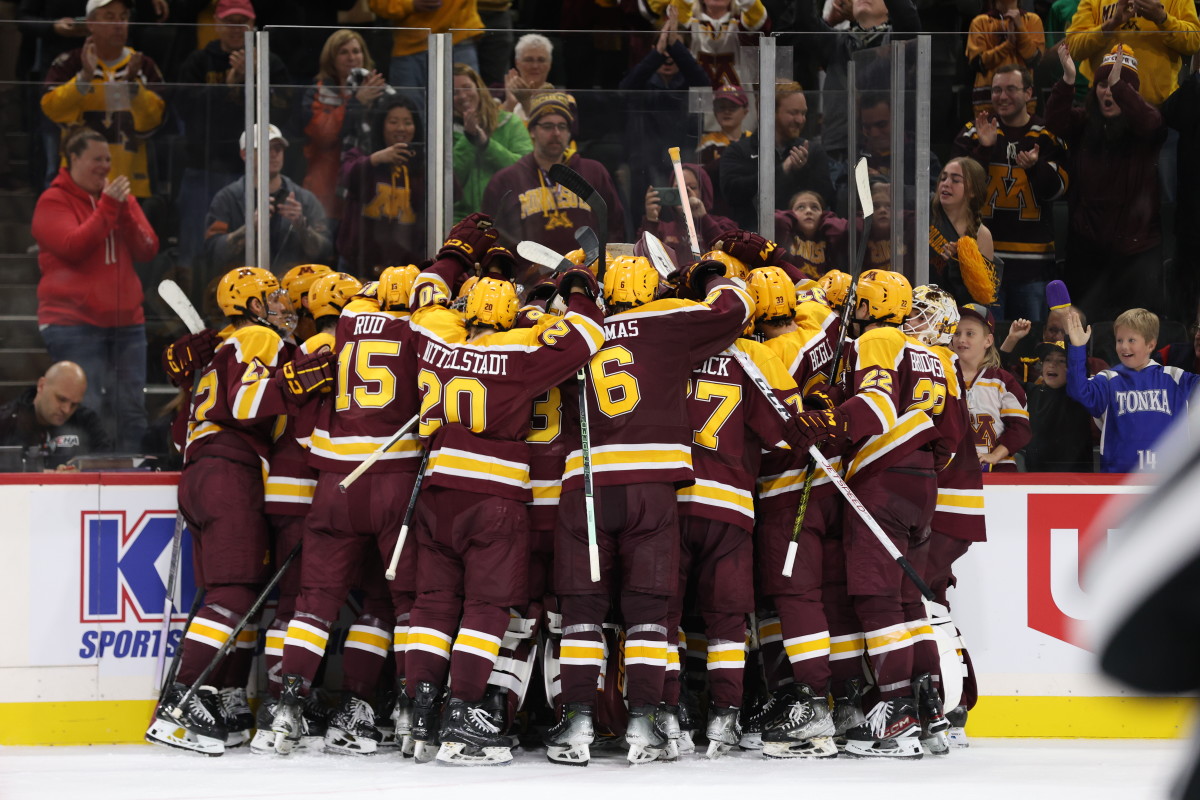 Gophers hockey players celebrate a win during the 2023-24 season.