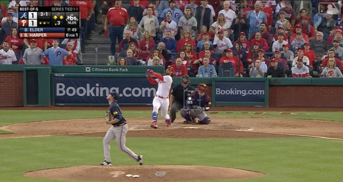 Braves pitcher Bryce Elder reacts to a home run from Phillies batter Bryce Harper