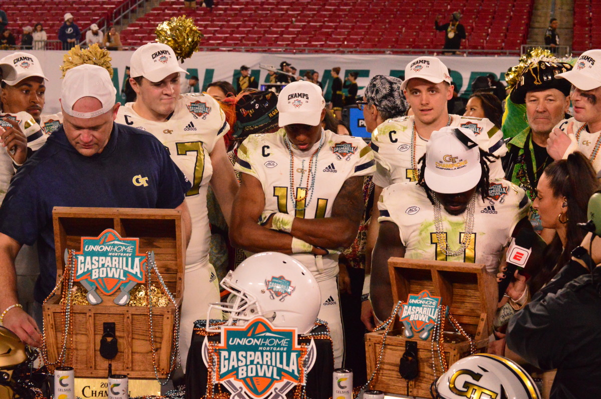 Brent Key celebrating with the team after their win against UCF