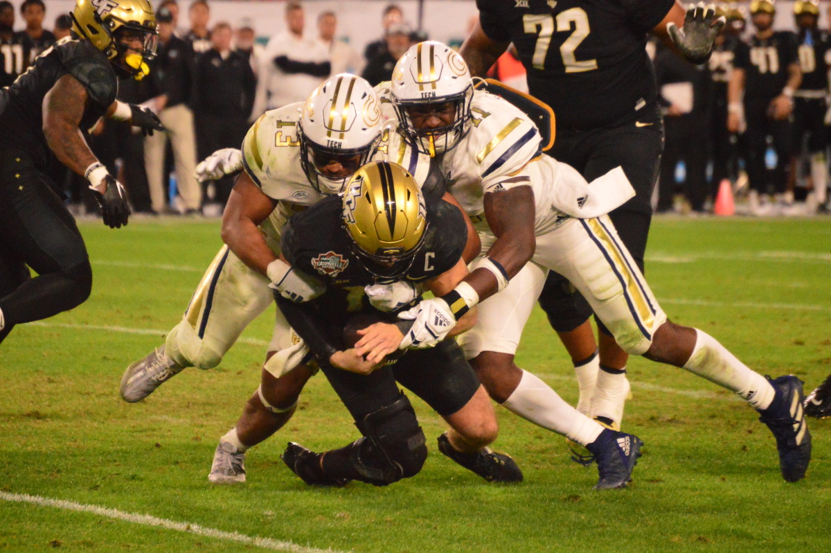 Georgia Tech making a tackle against UCF