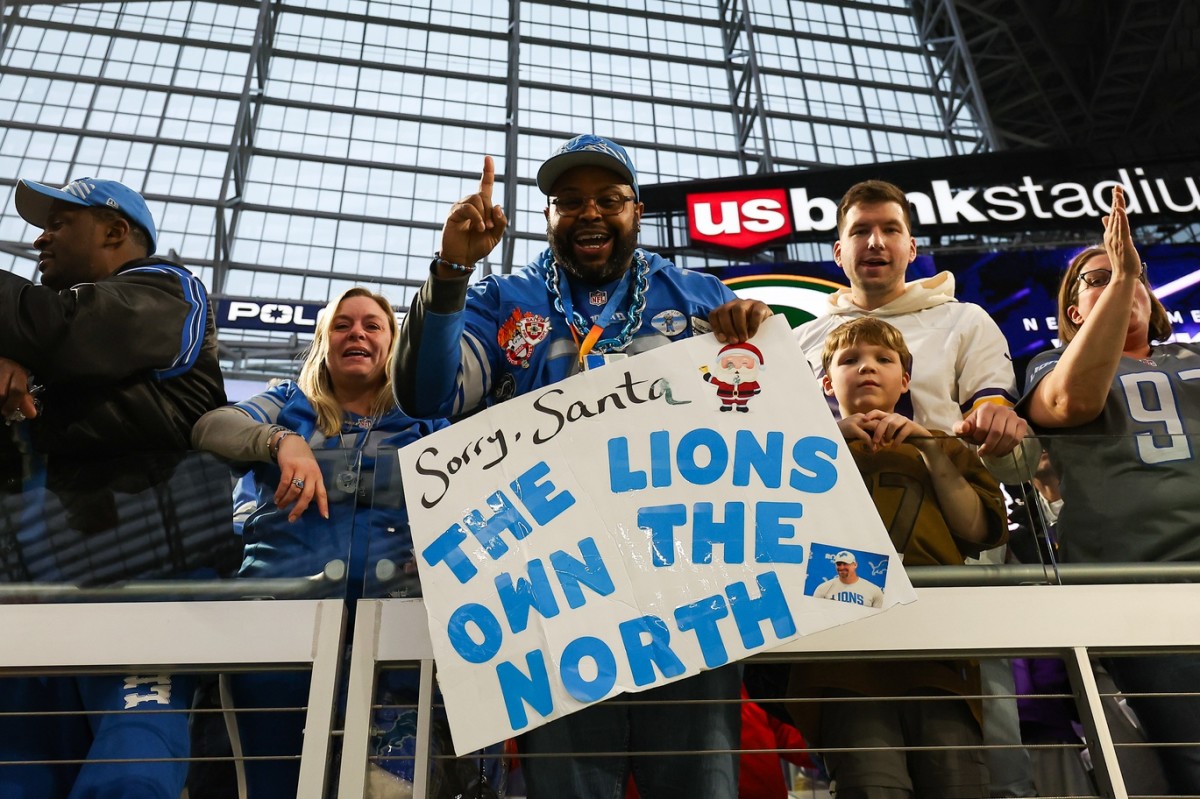 Dec 24, 2023; Minneapolis, Minnesota, USA; Detroit Lions fans celebrate the win against the Minnesota Vikings after the game at U.S. Bank Stadium. With the win the Detroit Lions clinched the NFC North.