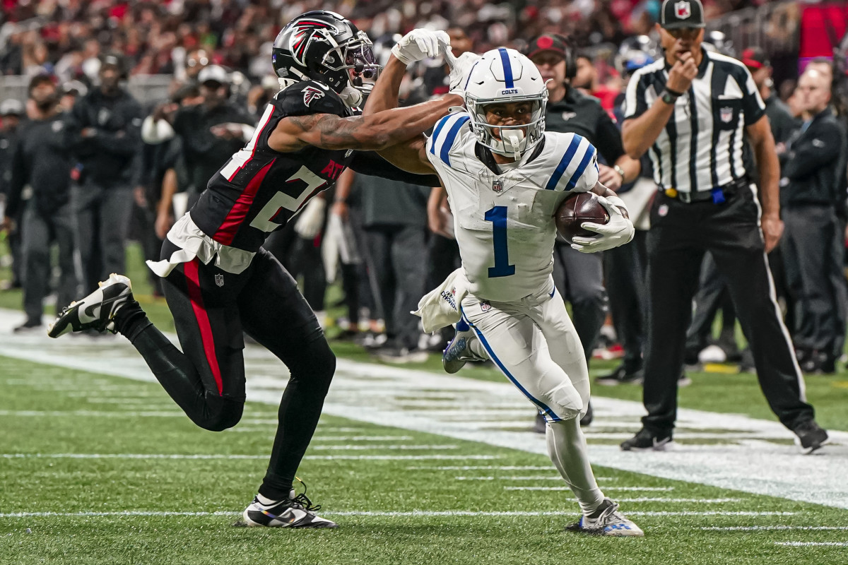 Dec 24, 2023; Atlanta, Georgia, USA; Indianapolis Colts wide receiver Josh Downs (1) runs against Atlanta Falcons cornerback A.J. Terrell (24) after a catch during the second half at Mercedes-Benz Stadium.