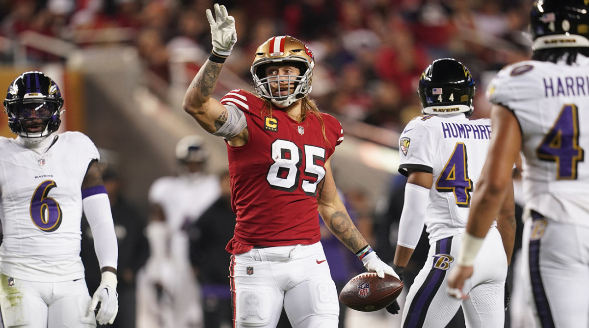 49ers tight end George Kittle reacts after making a catch for a first down