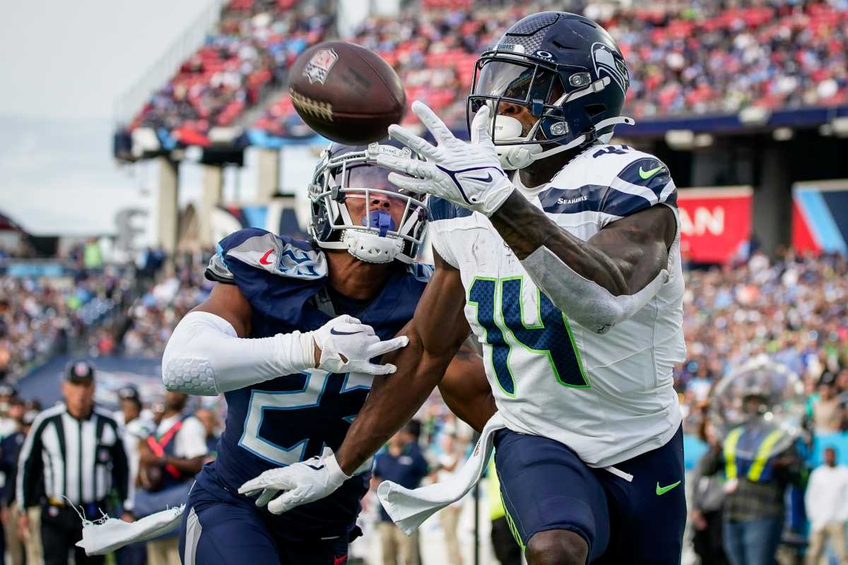 Seattle Seahawks wide receiver DK Metcalf (14) pulls in a touchdown past Tennessee Titans cornerback Tre Avery (23) during the fourth quarter at Nissan Stadium in Nashville, Tenn.,