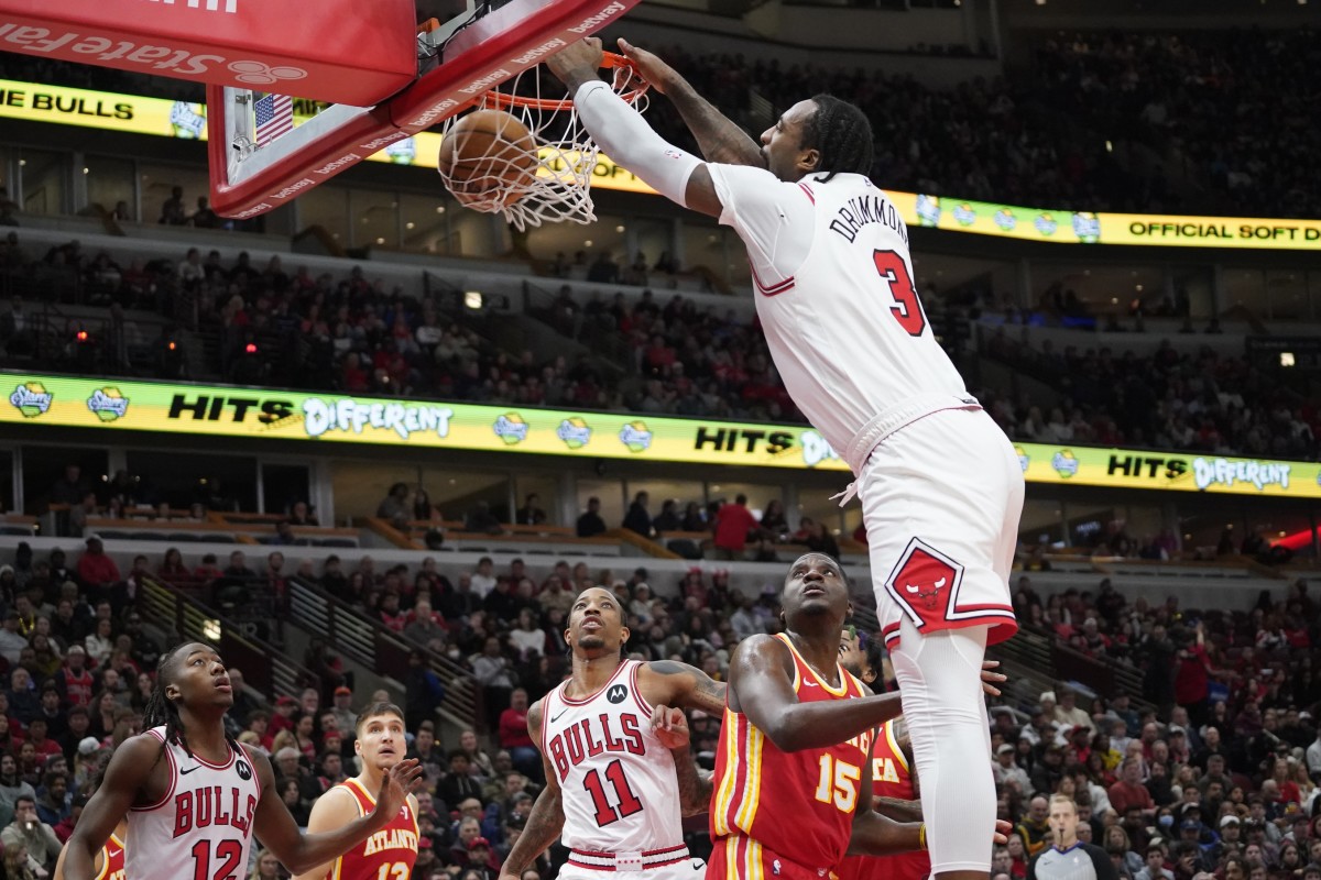 Chicago Bulls center Andre Drummond (3) dunks the ball over Atlanta Hawks center Clint Capela (15) during the first quarter at United Center.