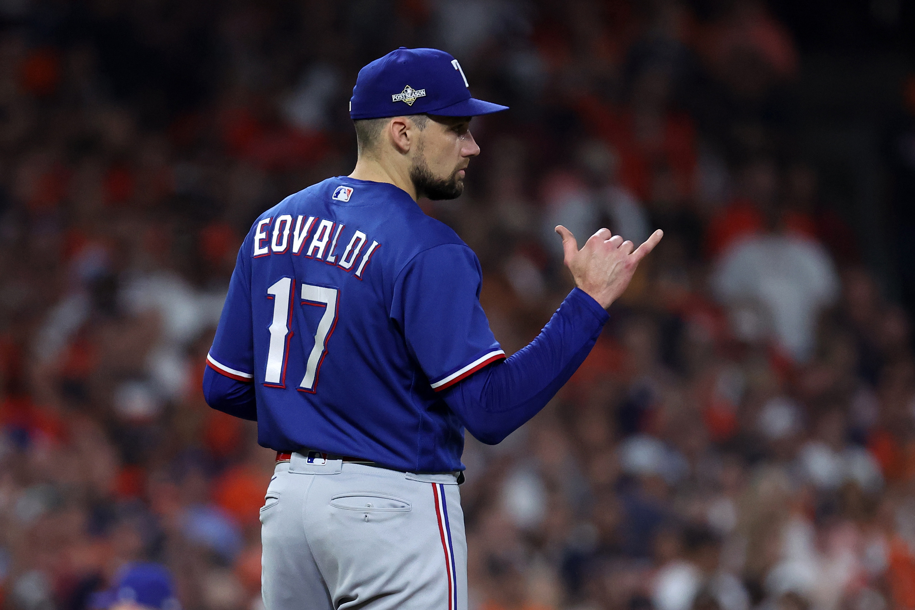 Texas Rangers starting pitcher Nathan Eovaldi reacts against the Houston Astros in the first inning during Game 6 of the ALCS on Oct. 22 at Minute Maid Park.