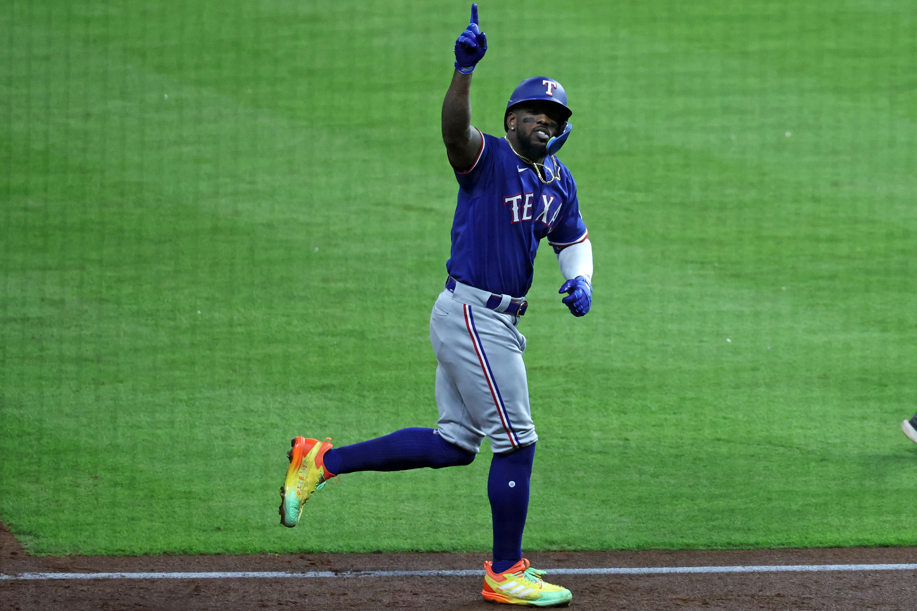 Texas Rangers right fielder Adolis Garcia reacts after hitting a grand slam against Houston Astros relief pitcher Ryne Stanek in the ninth inning of Game 6 of the ALCS on Oct. 22 at Minute Maid Park.