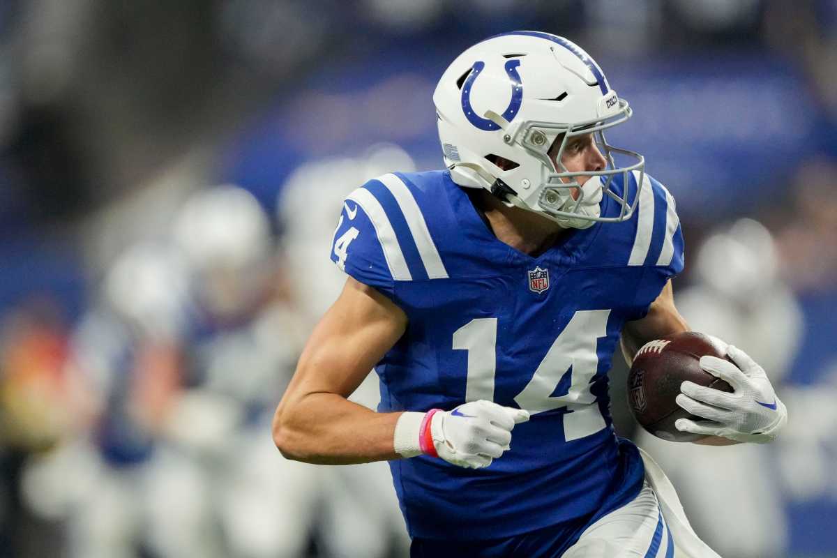 Indianapolis Colts wide receiver Alec Pierce (14) looks back as he runs to the end zone for a touchdown Sunday, Dec. 31, 2023, during a game against the Las Vegas Raiders at Lucas Oil Stadium in Indianapolis.  