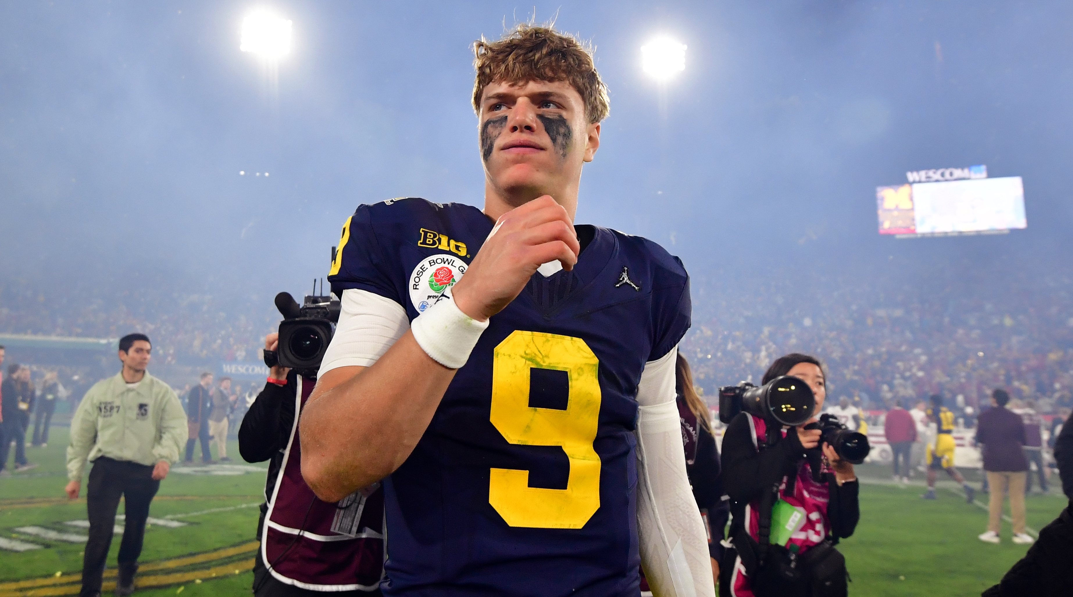 Michigan Wolverines quarterback J.J. McCarthy (9) walks off field after defeating the Alabama Crimson Tide in the Rose Bowl.