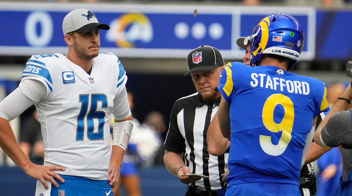 Detroit Lions quarterback Jared Goff and Los Angeles Rams quarterback Matthew Stafford meet at mid field.