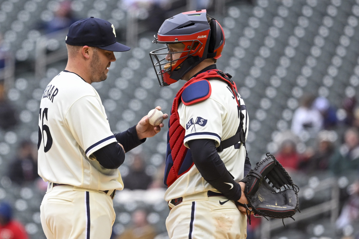 Caleb Thielbar and Ryan Jeffers talk at the mound