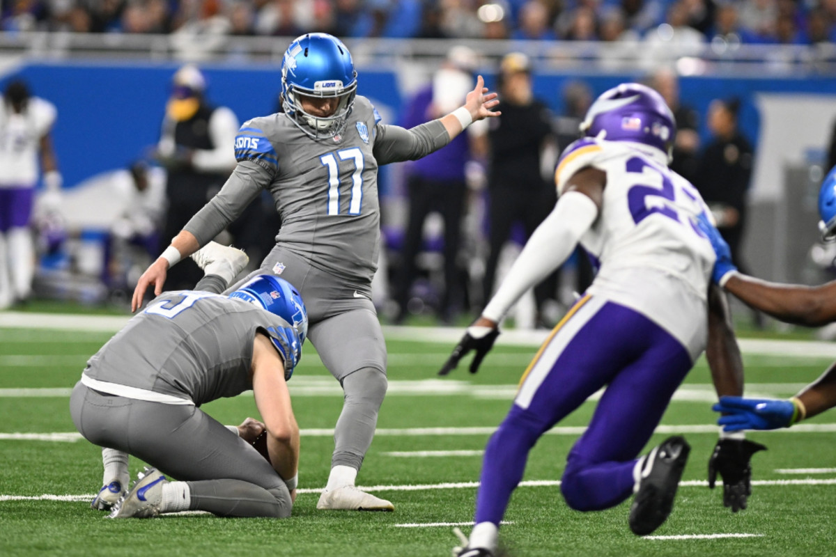 Detroit Lions kicker Michael Badgley kicks an extra point against the Minnesota Vikings.