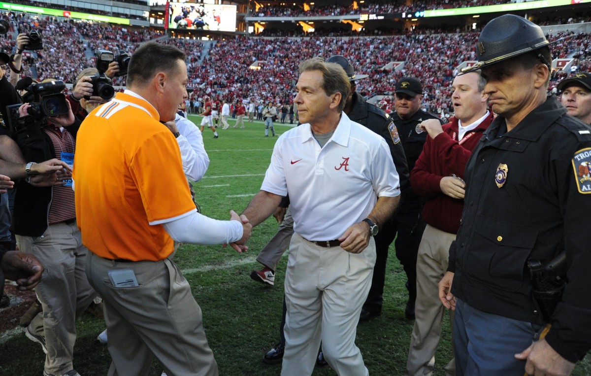 Butch Jones and Nick Saban