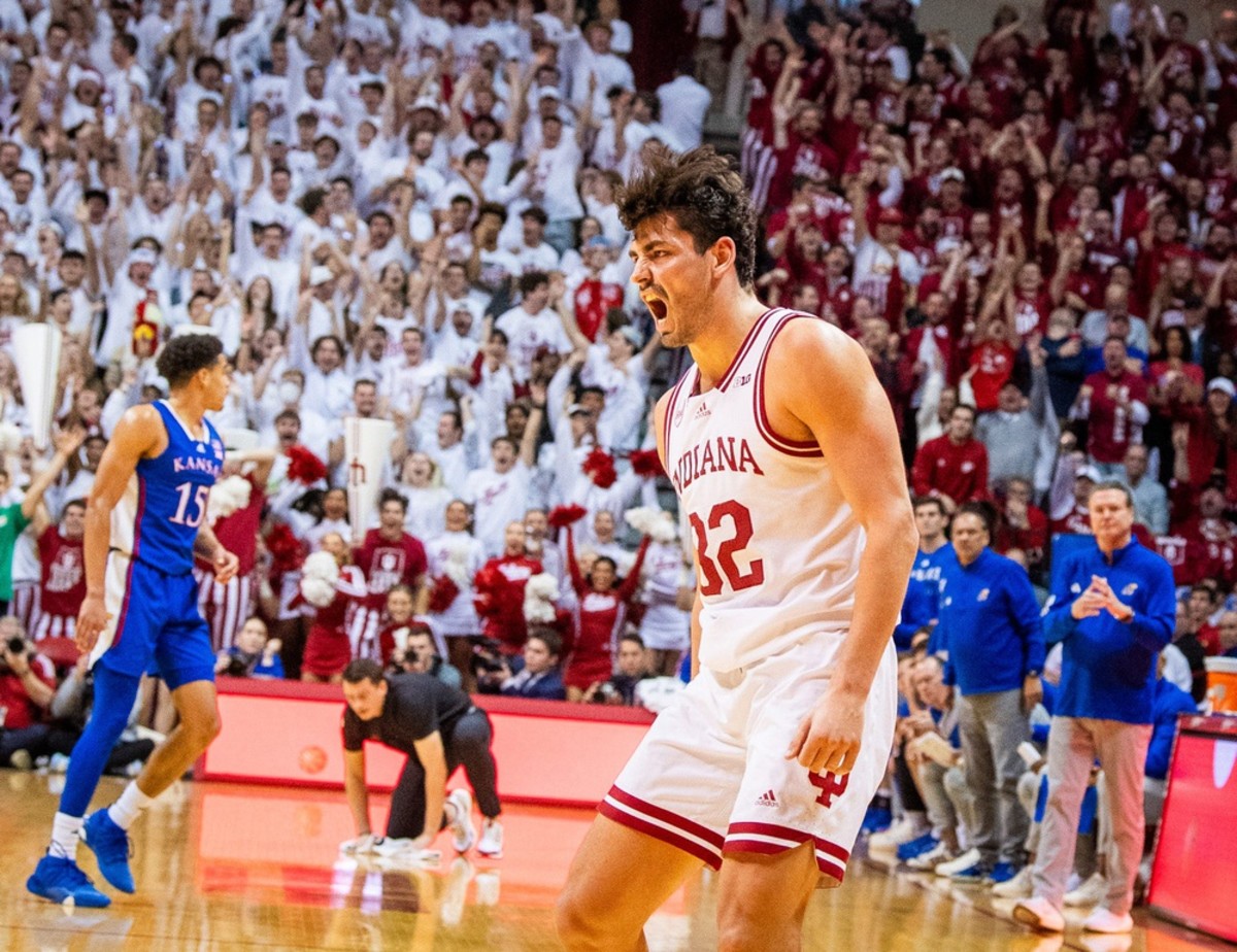 Indiana's Trey Galloway (32) celebrates hitting a big 3-pointer during the second half of the Indiana versus Kansas men's basketball game at Simon Skjodt Assembly Hall on Saturday, Dec. 16, 2023.