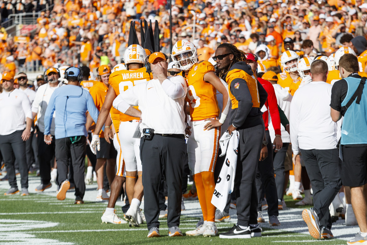 Tennessee Volunteers HC Josh Heupel with QBs Nico Iamaleava and Joe Milton III during the win over Iowa. (Photo by Morgan Tencza of USA Today Sports)