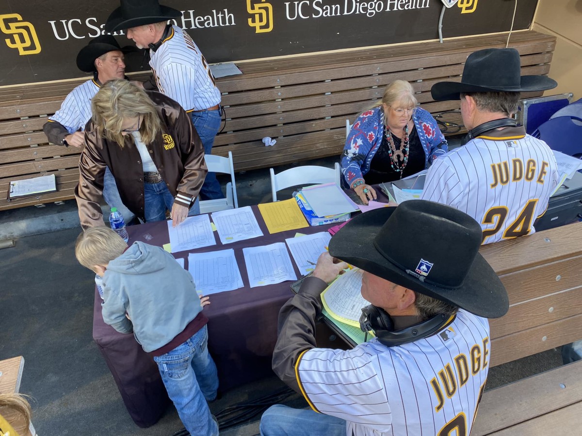 The judges of the San Diego Rodeo were seen wearing Padres jerseys as their professional uniforms for the rodeo.