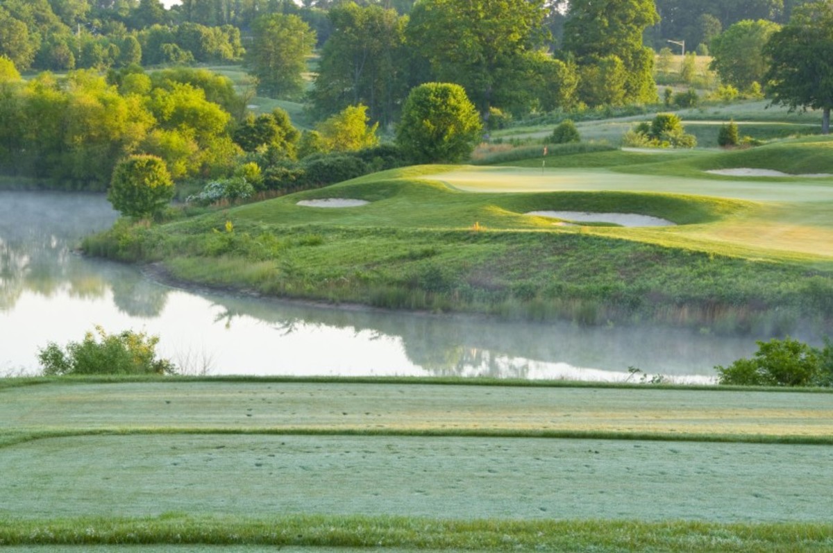 Laurel Hill Golf Club's par-3 16th hole features a daunting tee shot over water and a green-front bunker.  