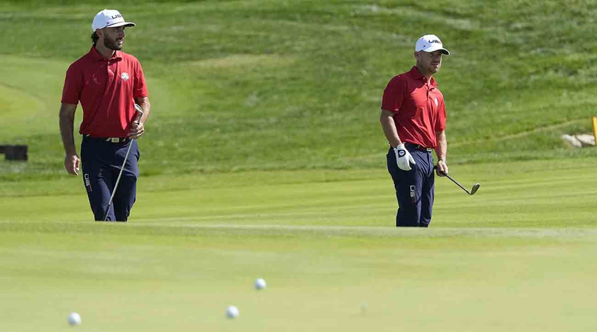 Brian Harman, right and Max Homa look at lie of the green during a practice round ahead of the 2023 Ryder Cup at the Marco Simone Golf Club in Italy.