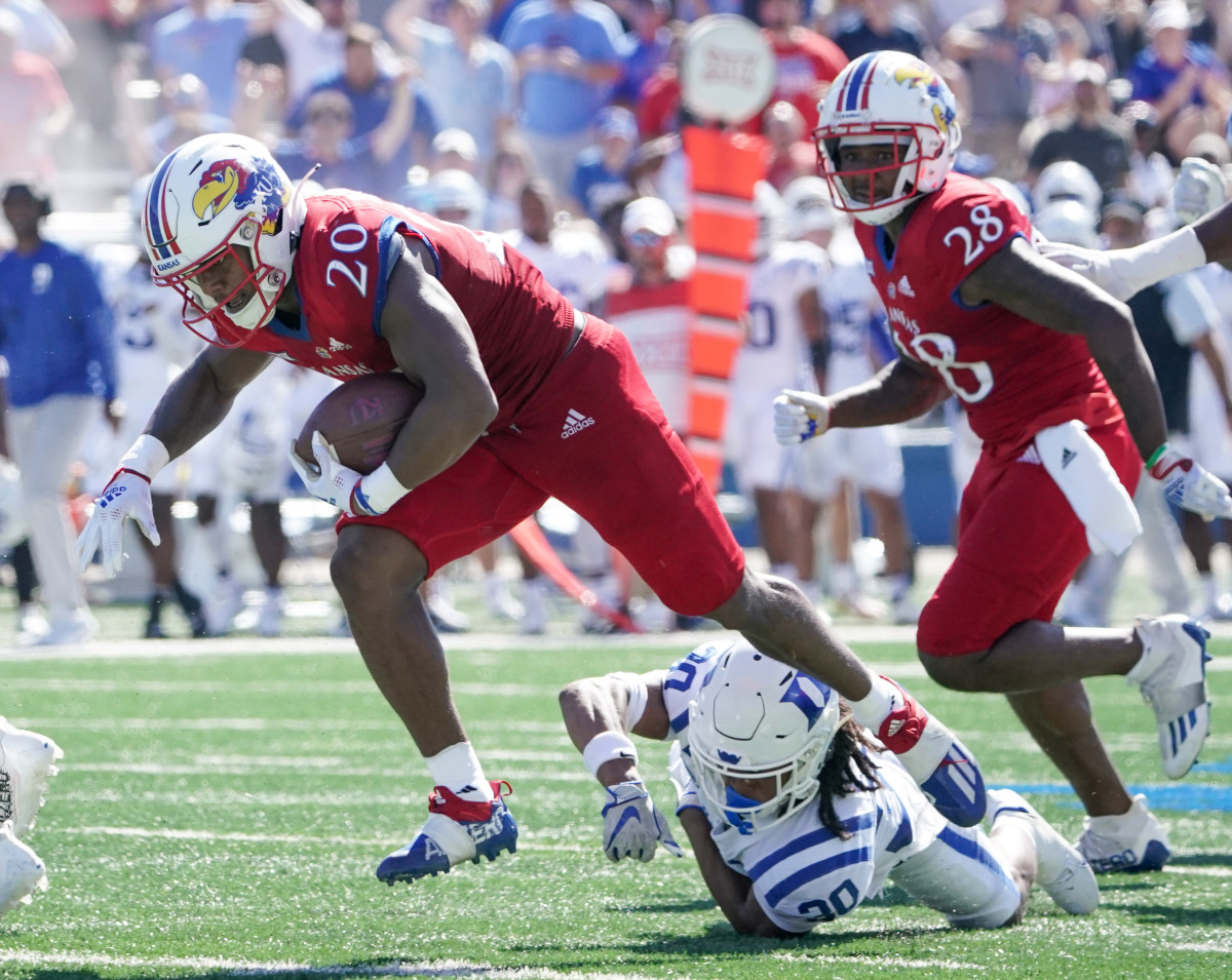 Duke Blue Devils defensive back Brandon Johnson attempts a tackle against the Kansas Jayhawks.