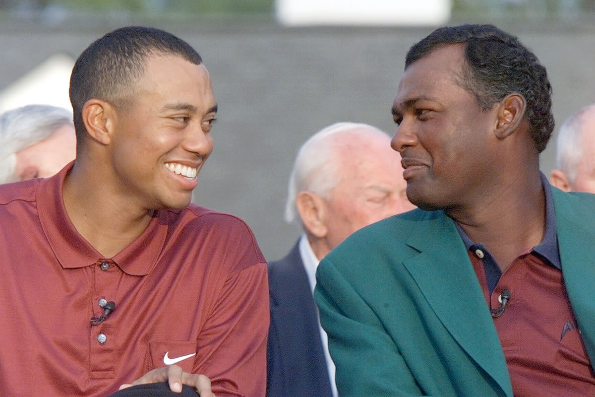 Vijay Singh and Tiger Woods laugh together at the 2000 Masters.