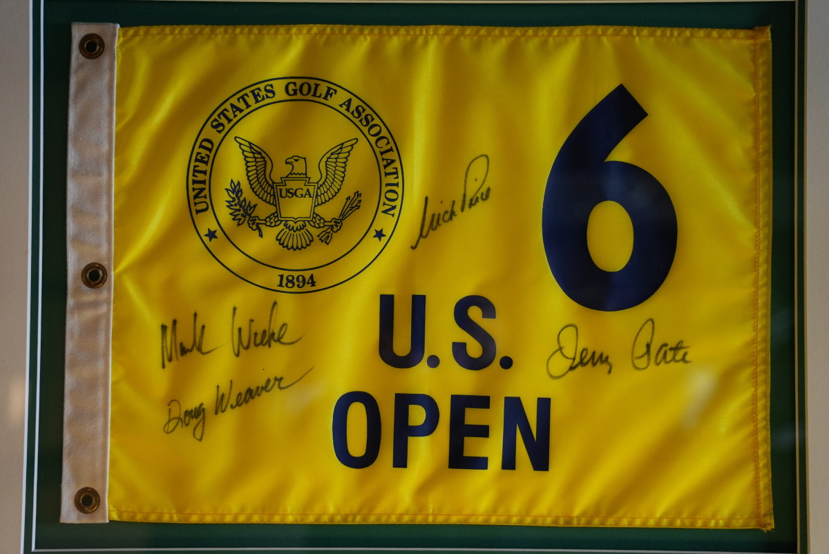 A flag from the 1989 U.S. Open signed by the four players who aced the sixth hole in the second round.