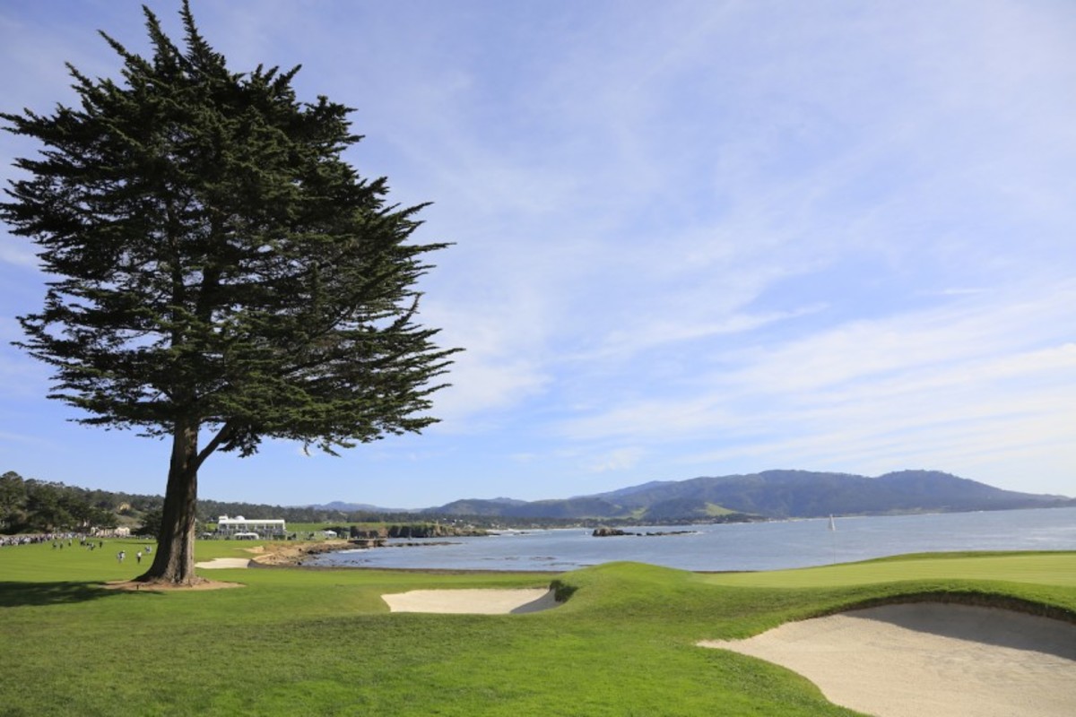 The par-5 18th hole at Pebble Beach (Calif.) Golf Links doglegs left around Stillwater Cove in one of the most picturesque finishes in golf. 