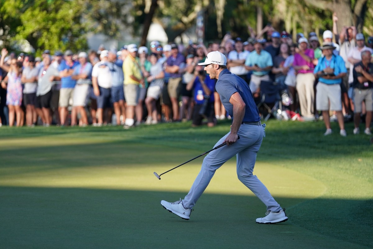 Sam Burns exalts after the winning putt at the 2022 Valspar Championship.