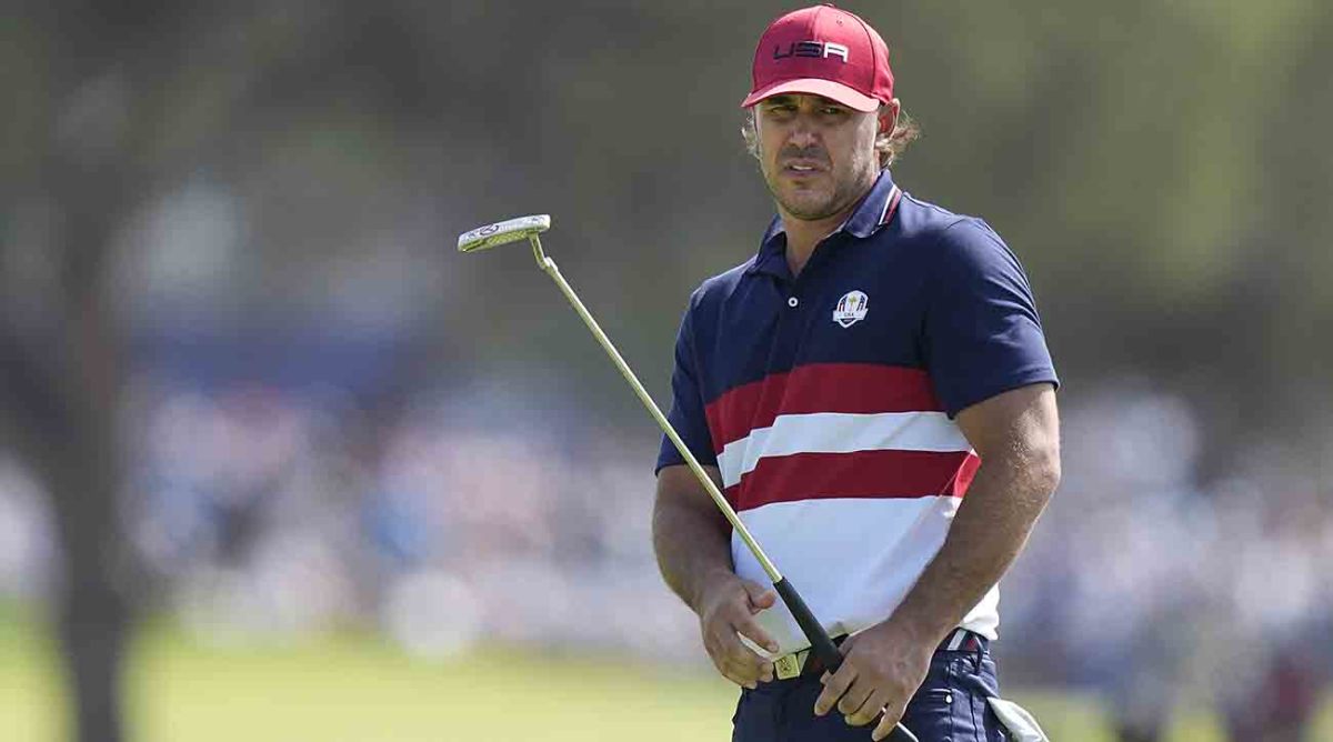 Brooks Koepka reacts to his putt on the 2nd green during their his match at the 2023 Ryder Cup golf tournament at the Marco Simone Golf Club in Italy.