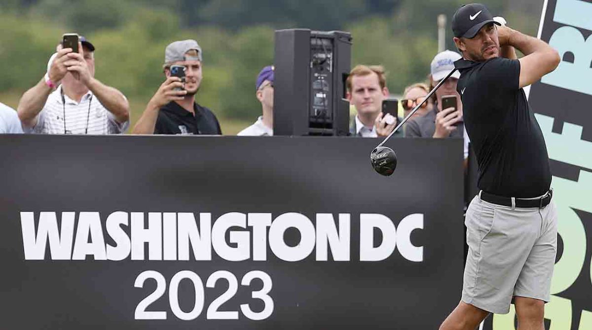 Brooks Koepka is pictured teeing off at the 2023 LIV Golf Washington, D.C. event.