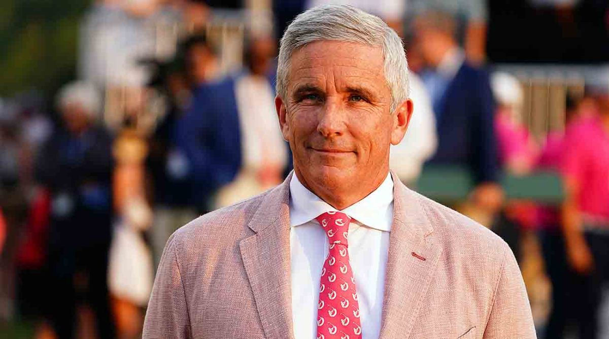 PGA Tour commissioner Jay Monahan waits on the 18th green during the final round of the 2023 Tour Championship at East Lake Golf Club.