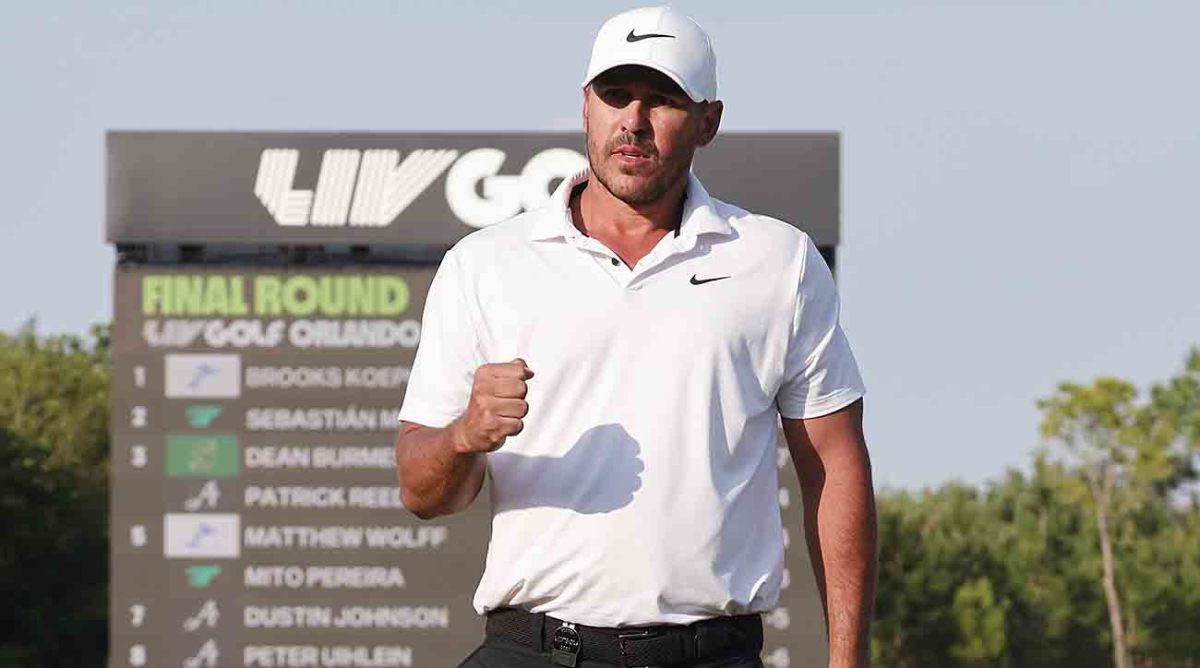 Brooks Koepka pumps a fist after winning the LIV Golf Orlando event.