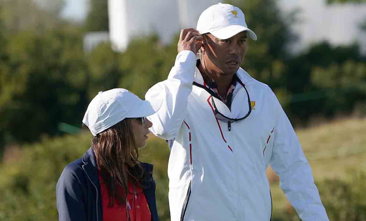 Assistant captain to the U.S. team Tiger Woods (right) walks with Erica Herman during the second round four-ball matches of the 2017 President's Cup  at Liberty National Golf Course.