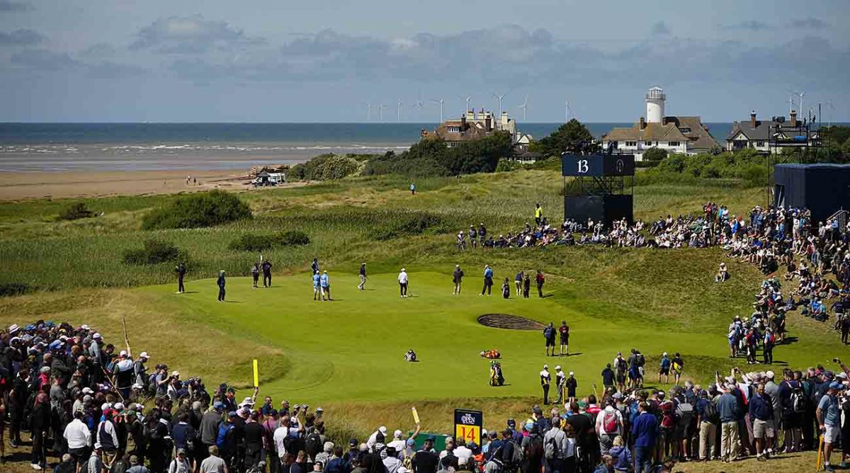 Golfers play on the 13th green during a practice round for the 2023 British Open at Royal Liverpool Hoylake, England.