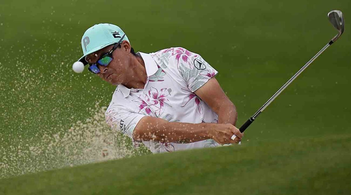 Rickie Fowler hits from a bunker in the 2023 WGC-Dell Match Play.