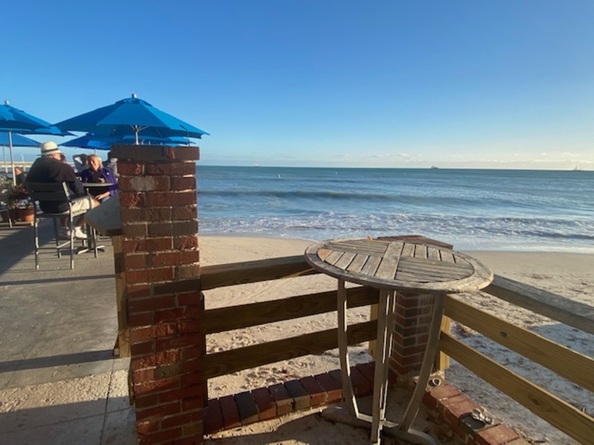 An outdoor table is pictured at Louie's Backyard.