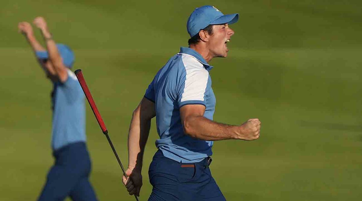 Europe's Viktor Hovland reacts and celebrates after his birdie putt earned Europe a tie in his afternoon fourballs match at the 2023 Ryder Cup in Italy.