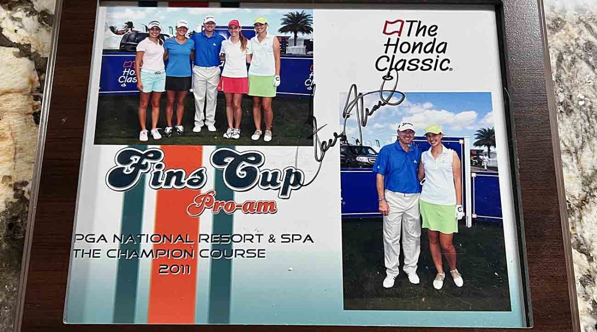 Kelly Okun's plaque from the 2011 Honda Classic pro-am, including a picture of her with pro Steve Flesch.