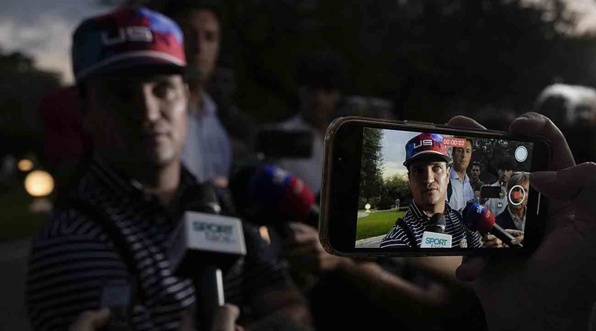 U.S. Ryder Cup team captain Zach Johnson talks to reporters as he returns with members of his team at a hotel in Rome, Friday, Sept. 8, 2023, at the end of a practice session at the Marco Simone golf club where the 2023 Ryder Cup will be held.