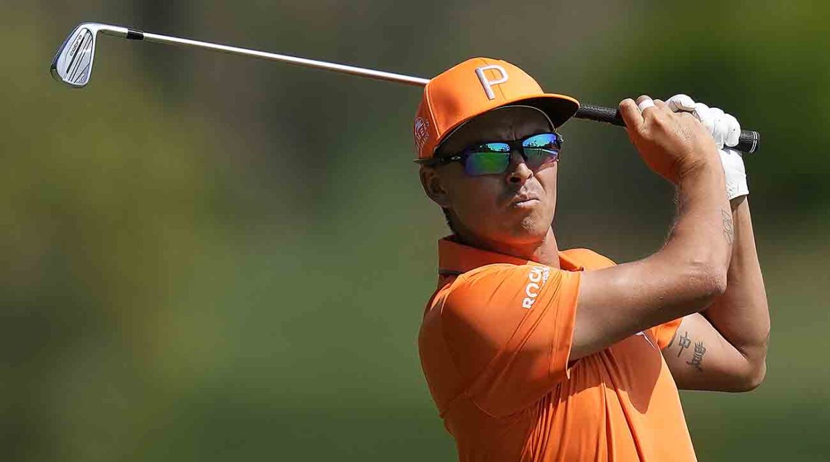 Rickie Fowler watches a shot at the 2023 Players Championship.